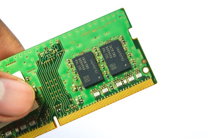 Person holding computer chip